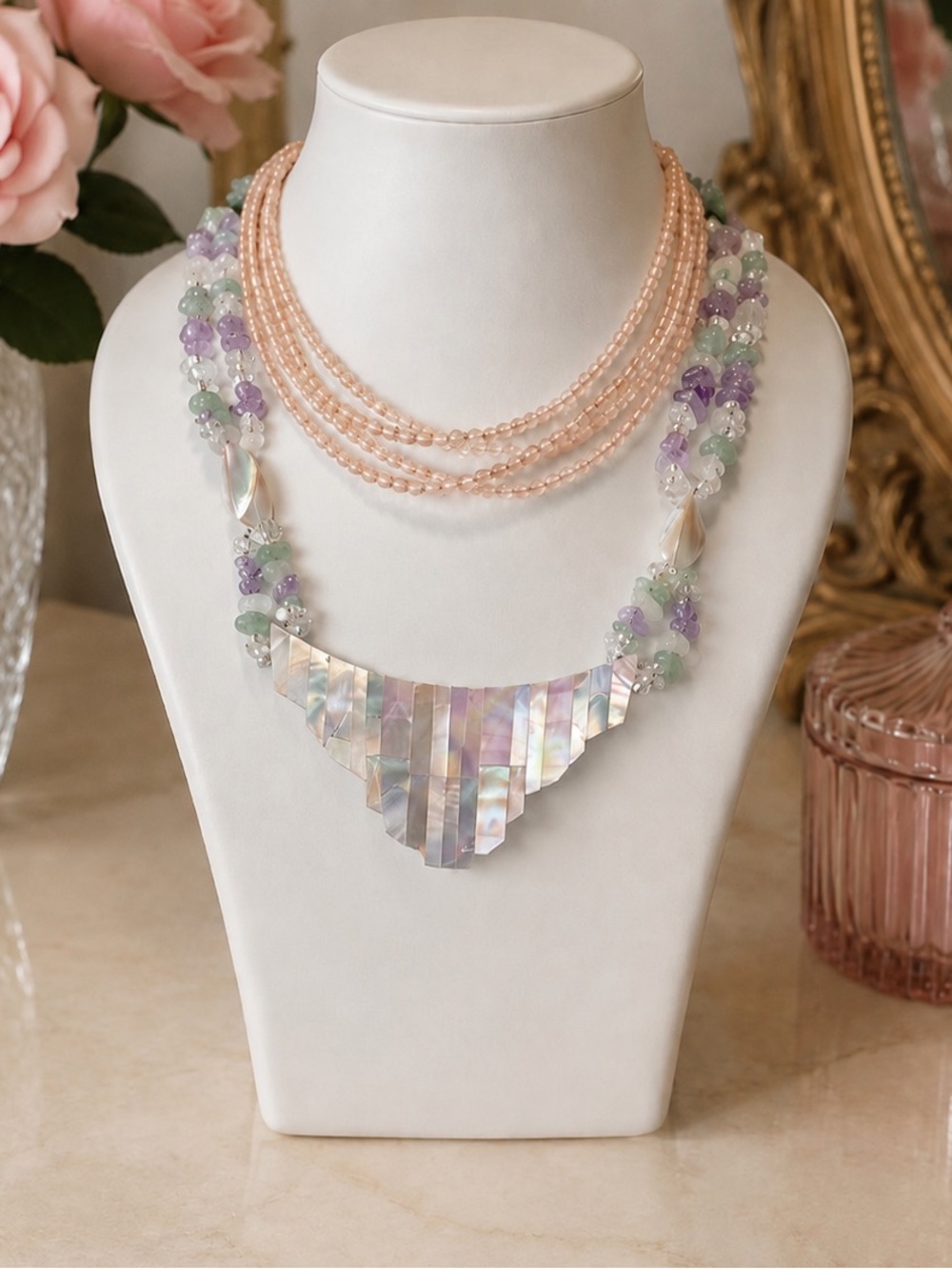 Beautiful pair of coordinating vintage necklaces in soft pastel colors.